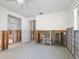 Spacious bedroom during renovation, ready for personalization with an attached closet and bathroom at 734 Canal Rd, Sarasota, FL 34242