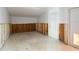 Spacious garage undergoing renovation, presenting a blank canvas for customization at 734 Canal Rd, Sarasota, FL 34242