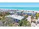 Coastal community near the beach with lush trees and modern architecture at 750 Bayport Way # 750, Longboat Key, FL 34228