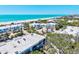 Coastal community near the beach with lush trees and modern architecture at 750 Bayport Way # 750, Longboat Key, FL 34228