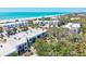 Coastal community near the beach with lush trees and modern architecture at 750 Bayport Way # 750, Longboat Key, FL 34228