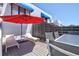 Balcony with outdoor furniture offering a relaxing spot to soak in the sun at 750 Bayport Way # 750, Longboat Key, FL 34228