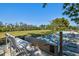 Bocce ball court framed with a grassy field in the background at 750 Bayport Way # 750, Longboat Key, FL 34228