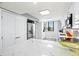 Updated kitchen with white cabinets, stainless steel appliances, and a spacious layout at 750 Bayport Way # 750, Longboat Key, FL 34228