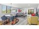 Cozy living room with plush seating, vibrant decor, and plenty of natural light at 750 Bayport Way # 750, Longboat Key, FL 34228