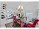 Inviting dining area offering lots of natural light, modern design, and an open floor plan at 8142 Misty Oaks Blvd, Sarasota, FL 34243