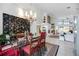 Open-concept dining room featuring modern decor and an inviting, spacious design at 8142 Misty Oaks Blvd, Sarasota, FL 34243