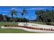 Palm Aire Country Club, The Lakes Course entrance sign with manicured landscaping, conveying an exclusive golf community at 8142 Misty Oaks Blvd, Sarasota, FL 34243