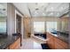 Well-lit main bathroom featuring a glass shower, standalone tub, and modern cabinets at 8142 Misty Oaks Blvd, Sarasota, FL 34243