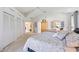 Spacious main bedroom features bright natural light, neutral decor, and lots of closet space at 8142 Misty Oaks Blvd, Sarasota, FL 34243