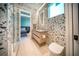 Stylist bathroom featuring designer tile and modern fixtures at 816 Goodrich Ave, Sarasota, FL 34236