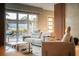 Modern living room with large windows, comfortable seating, and stylish decor, creating an inviting atmosphere at 816 Goodrich Ave, Sarasota, FL 34236