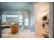 A modern living room with stylish furniture and a convenient laundry area at 816 Goodrich Ave, Sarasota, FL 34236