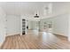 Open bedroom features recessed lights, an exterior door, and closet with mirrored doors at 1016 38Th W St, Bradenton, FL 34205