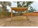 Close-up of the wooden gazebo in the backyard, showcasing its construction and design at 1016 38Th W St, Bradenton, FL 34205