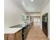 Kitchen featuring stainless steel appliances, wood cabinets, and a view into the living space at 1016 38Th W St, Bradenton, FL 34205