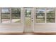 Bright sunroom with large windows offers plenty of natural light, creating a warm and inviting atmosphere at 1016 38Th W St, Bradenton, FL 34205
