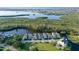 An aerial view of the property with lake and wetland views at 111 Tidy Island Blvd # 111, Bradenton, FL 34210