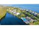 Waterfront property with a community pool and lush landscaping at 111 Tidy Island Blvd # 111, Bradenton, FL 34210