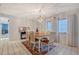 Elegant dining area with chandelier lighting, neutral walls, and comfortable seating at 111 Tidy Island Blvd # 111, Bradenton, FL 34210