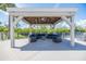 Outdoor gazebo with comfortable seating overlooking the water at 111 Tidy Island Blvd # 111, Bradenton, FL 34210