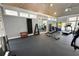Well-equipped gym with exercise machines and weights in a bright and airy space with high ceilings at 111 Tidy Island Blvd # 111, Bradenton, FL 34210