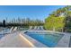 Oversized hot tub and lounge area with river views and lush landscaping provide a relaxing space at 111 Tidy Island Blvd # 111, Bradenton, FL 34210