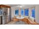 Bright kitchen nook with wrap around seating and views of the neighborhood at 111 Tidy Island Blvd # 111, Bradenton, FL 34210