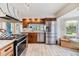 Updated kitchen with stainless steel appliances, breakfast nook, and wooden cabinets, a perfect blend at 111 Tidy Island Blvd # 111, Bradenton, FL 34210