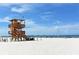 Lifeguard stand overlooking beach, providing security and scenic views for beach goers at 111 Tidy Island Blvd # 111, Bradenton, FL 34210
