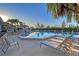 Inviting community pool with comfortable lounge chairs and a gazebo, perfect for relaxation at 111 Tidy Island Blvd # 111, Bradenton, FL 34210