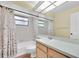 This bathroom features a vanity and a shower/tub combo at 1143 131St E St, Bradenton, FL 34212