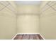 This walk in closet features wire shelves and wood floors at 1143 131St E St, Bradenton, FL 34212