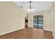 Dining area has an open layout, featuring tile flooring and a screened-in pool view at 1143 131St E St, Bradenton, FL 34212
