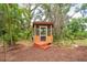 Private backyard gazebo surrounded by lush landscaping, providing a tranquil retreat; perfect for relaxation at 1143 131St E St, Bradenton, FL 34212