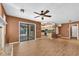 Large living area with access to screened pool and view to modern kitchen at 1143 131St E St, Bradenton, FL 34212