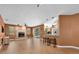 Open living space connects to kitchen, with a fireplace and pool access at 1143 131St E St, Bradenton, FL 34212