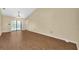 Open living area with tile flooring and sliding glass doors to the backyard pool at 1143 131St E St, Bradenton, FL 34212
