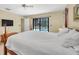 Bright main bedroom with a door to the pool and contemporary decor at 1143 131St E St, Bradenton, FL 34212