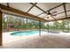 Relax in style with this sparkling pool and spa, enclosed within a screened lanai, surrounded by beautiful landscaping at 1143 131St E St, Bradenton, FL 34212