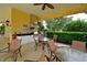 Outdoor kitchen featuring stainless steel grill, sink, and ample counter space, perfect for entertaining guests at 12330 Halfmoon Lake Ter, Bradenton, FL 34211