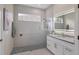 Contemporary bathroom features a spacious glass shower and vanity at 12516 Thornhill Ct, Lakewood Ranch, FL 34202
