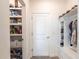 Well-organized mudroom with built-in storage, shelving, and a pantry area at 13422 Flat Woods Ter, Bradenton, FL 34211