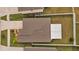 Aerial view of home featuring fenced yard, screened in patio and well maintained lawn at 13422 Willow Bluestar Loop, Riverview, FL 33579