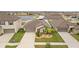 Aerial view of a single-Gathering home featuring a two-car garage, manicured lawn, and mature trees at 13422 Willow Bluestar Loop, Riverview, FL 33579