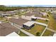 Aerial view of fenced backyard and screened in patio in a Gathering friendly neighborhood at 13422 Willow Bluestar Loop, Riverview, FL 33579