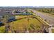 Aerial view of the community dog park surrounded by lush landscaping at 13422 Willow Bluestar Loop, Riverview, FL 33579