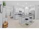 Open kitchen with granite countertops, stainless steel appliances, and a breakfast bar at 13422 Willow Bluestar Loop, Riverview, FL 33579