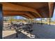 Covered picnic area with multiple tables and benches, perfect for outdoor gatherings and relaxation in a community setting at 13422 Willow Bluestar Loop, Riverview, FL 33579