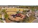 Aerial view of the community playground with slides and other play equipment at 13422 Willow Bluestar Loop, Riverview, FL 33579